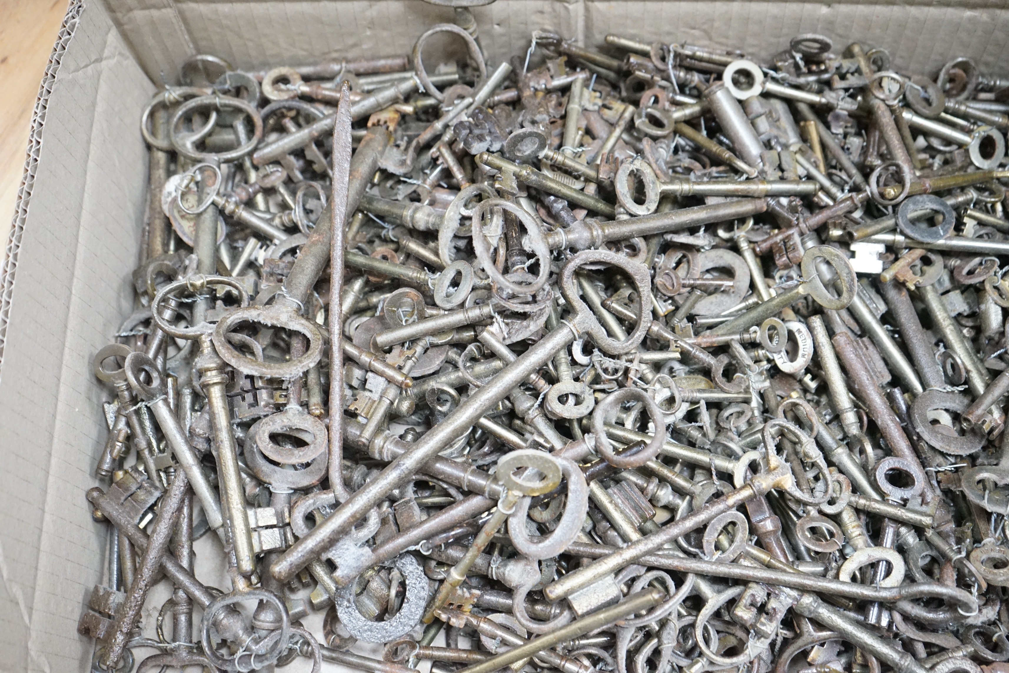 A large collection of antique keys